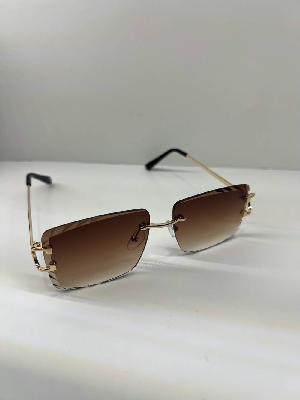 Cartier Gold Rimless Sunglasses with Brown Gradient Lenses